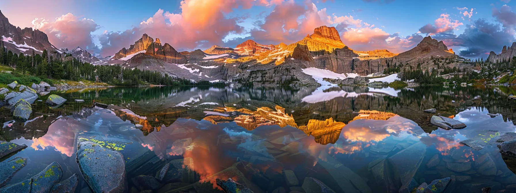 a vibrant sunset illuminates a serene mountain lake, reflecting a kaleidoscope of colors in the calm water while towering peaks loom majestically in the background.